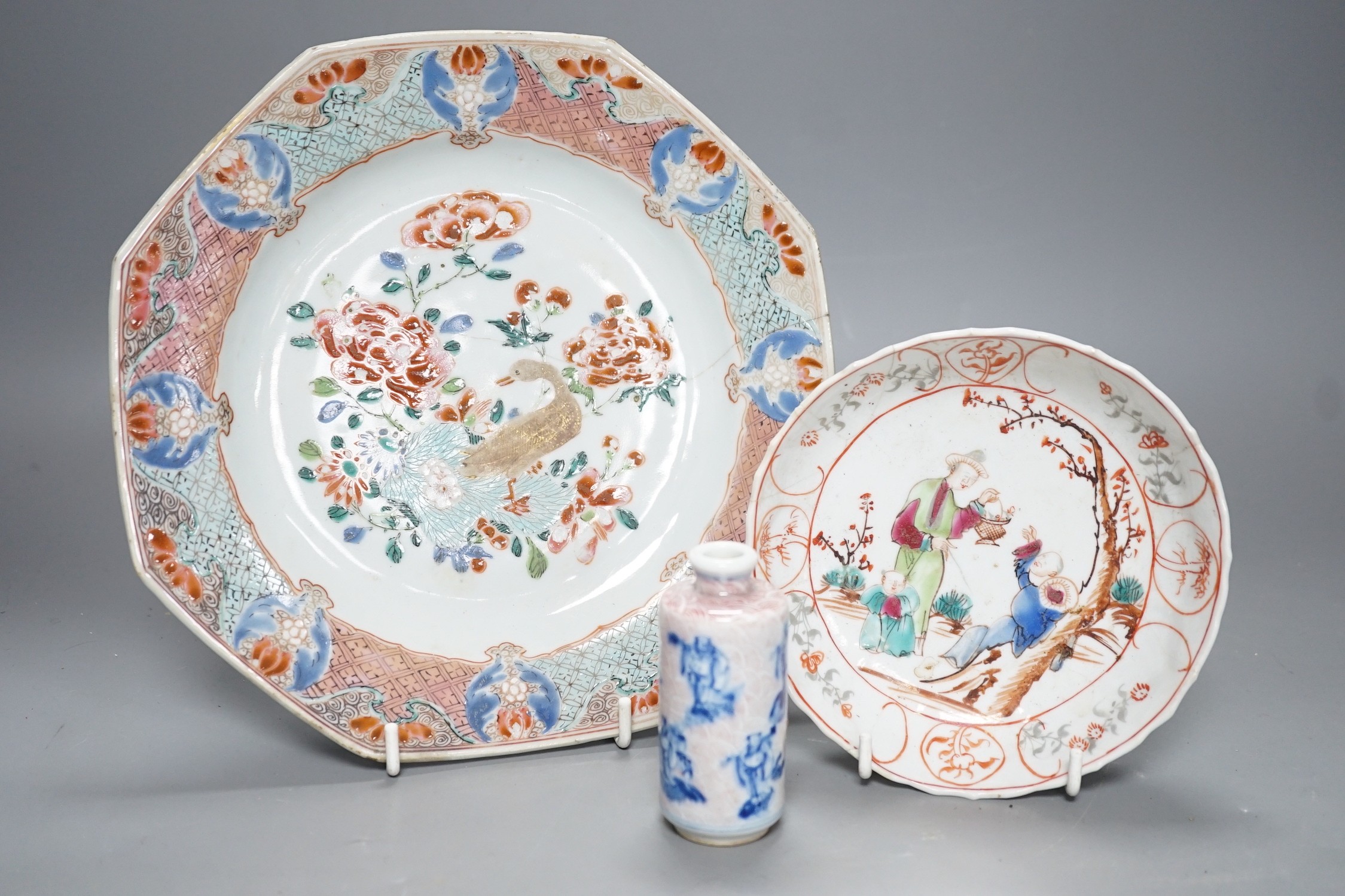 An 18th century Chinese export octagonal dish, a similar saucer and an underglaze blue and red snuff bottle